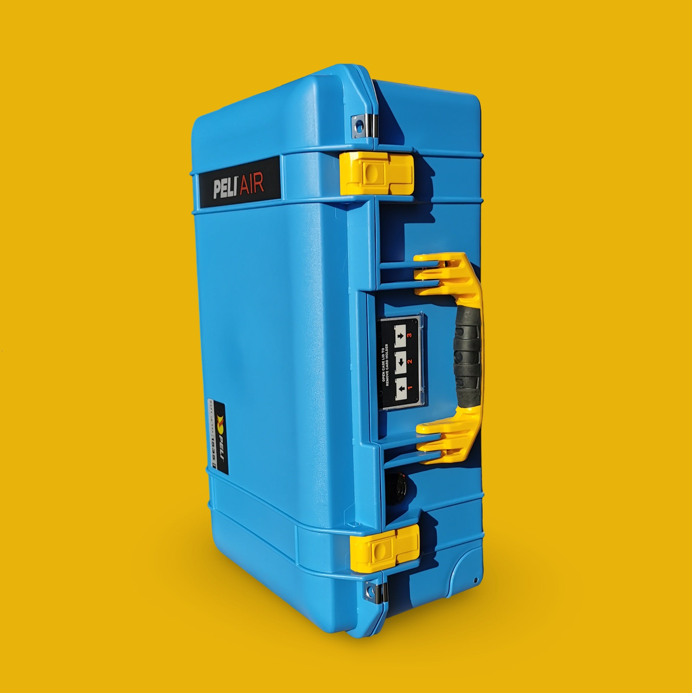 Coffre_Peli_1535_Bleu_Jaune_A_Main