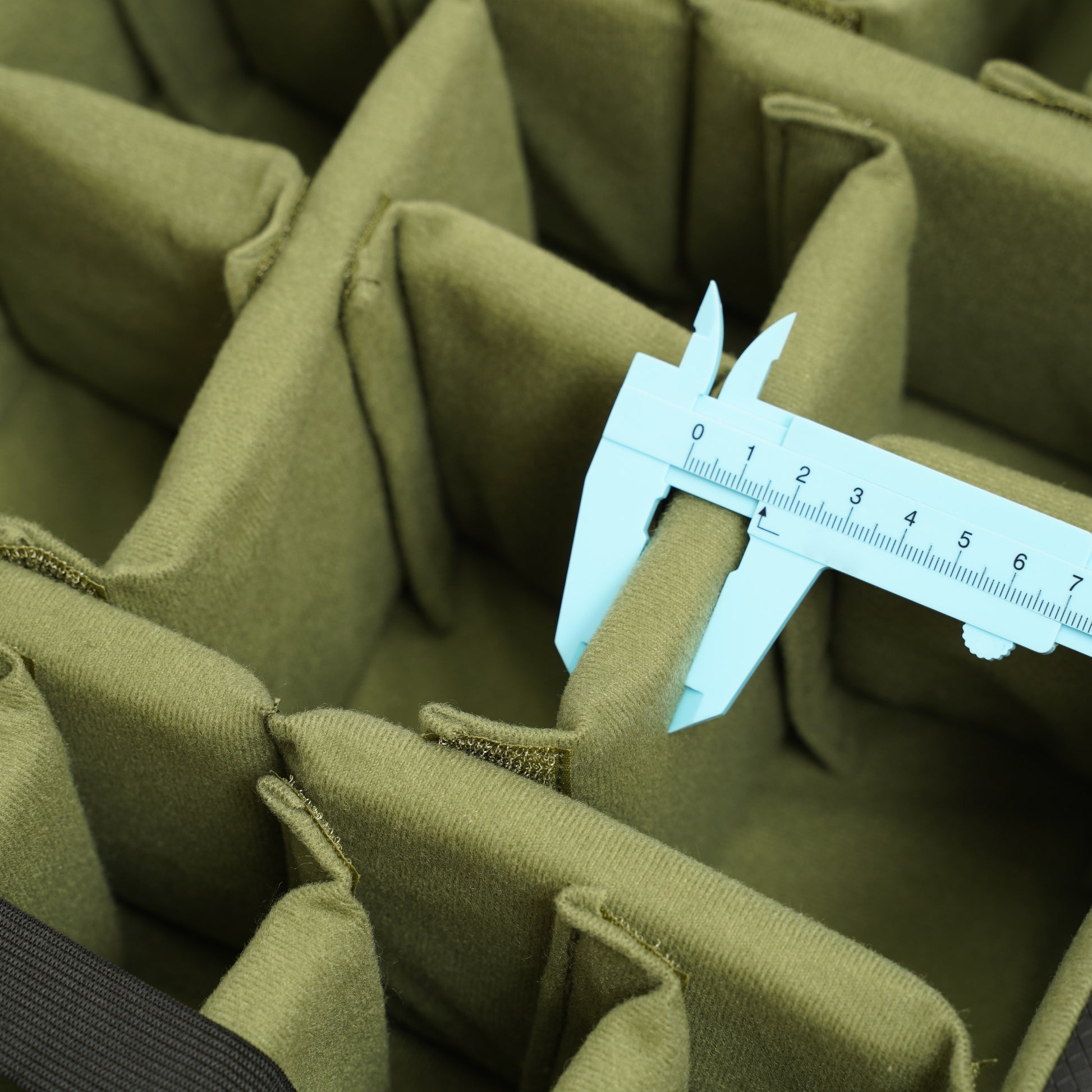 Army green padded divider organiser for the Peli 1560 case
